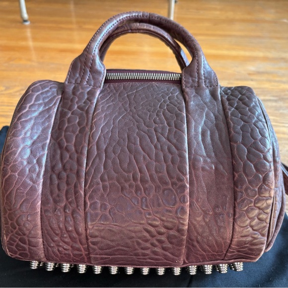 Alexander Wang Handbags - Alexander Wang Rocco Bag , Burgundy with Silver-Toned Hardware, Studded bottom.